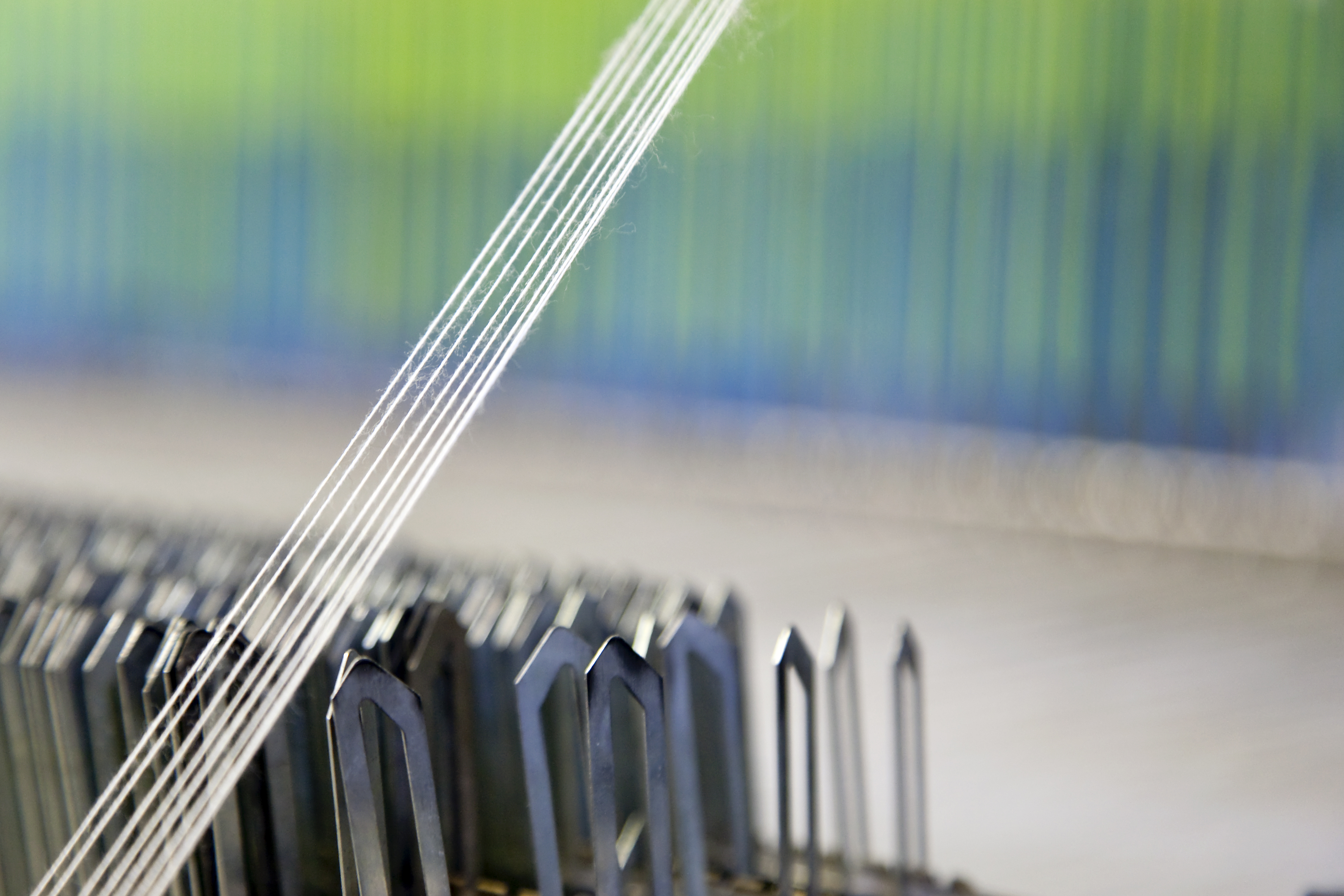 Nahaufnahme Weberei Webstuhl bei Biederlack